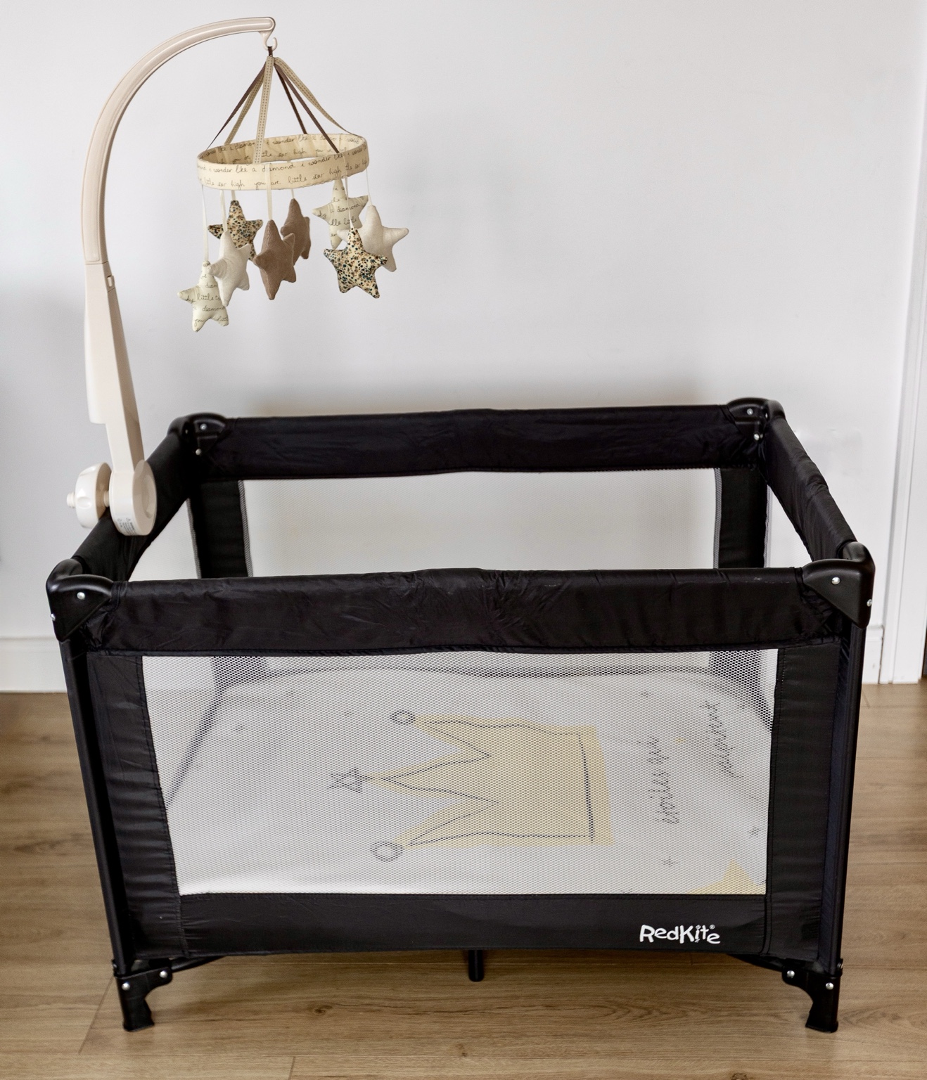 Baby cot and mobile available for postpartum clients at MÖKA Pilates