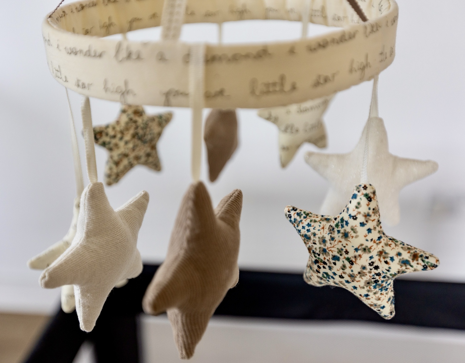 Soft star mobile above the baby cot at MÖKA Pilates